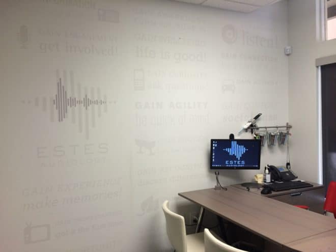 Indoor image of desk and wall at Estes Audiology Austin