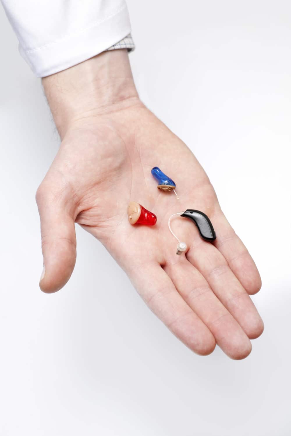 hearing aids in hand