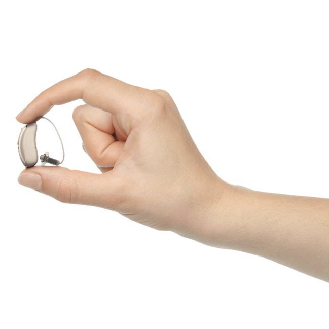 hand holding hearing aid
